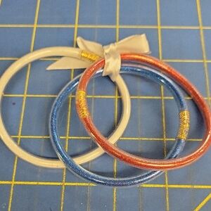 Set of Three Glittery Bangles in Blue, Red, and White Jelly